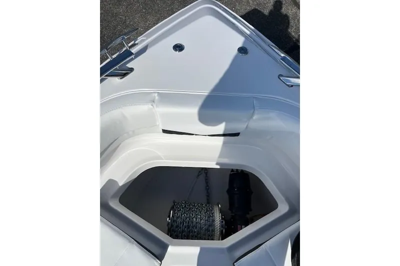 Slide: The Image of Bow anchor compartment of 2026 Monterey Elite 27 SD boat. - 16