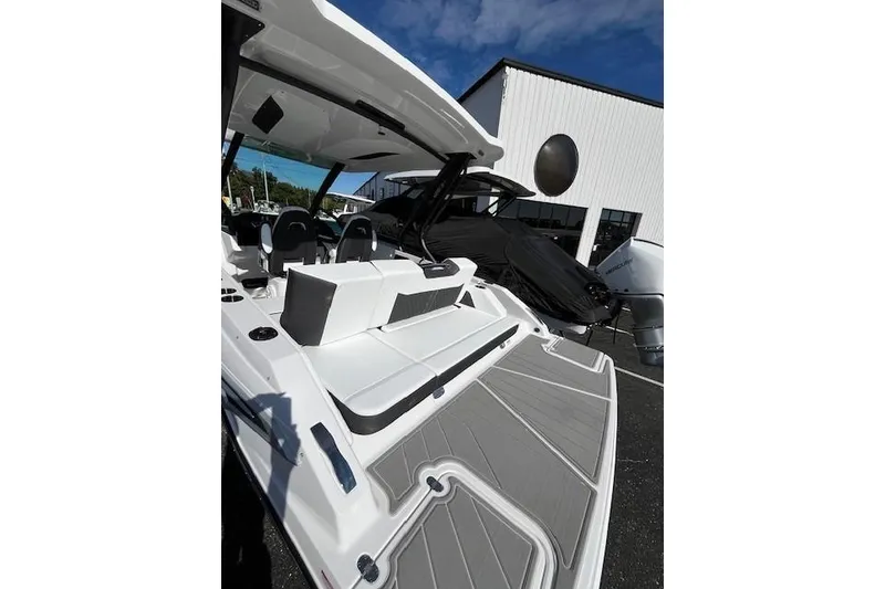 Slide: The Image of 2026 Monterey Elite 27 SD boat with sleek design and modern seating. - 22