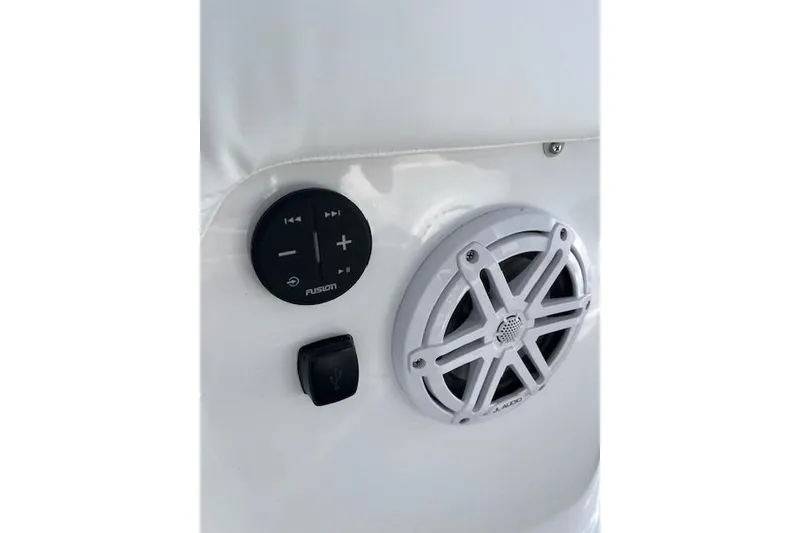 Slide: The Image of Audio controls and speaker on 2026 Monterey Elite 27 SD boat. - 26