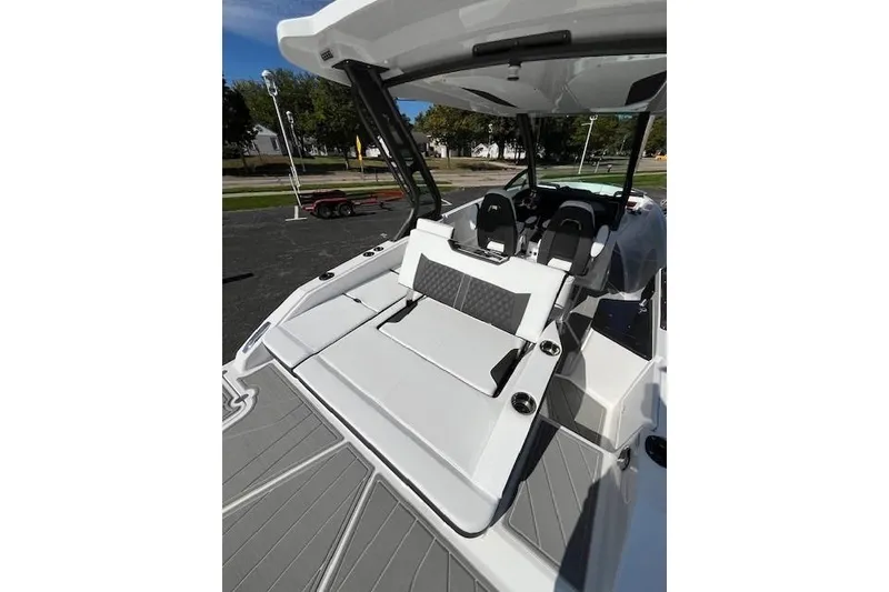 Slide: The Image of 2026 Monterey Elite 27 SD boat interior with sleek seating and modern design. - 4