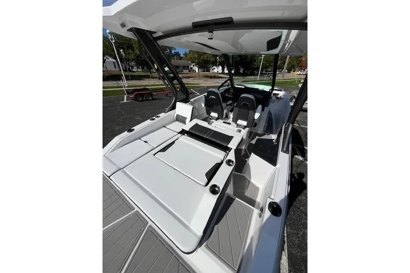 Slide: The Image of 2026 Monterey Elite 27 SD boat interior with sleek seating and modern design. - 5