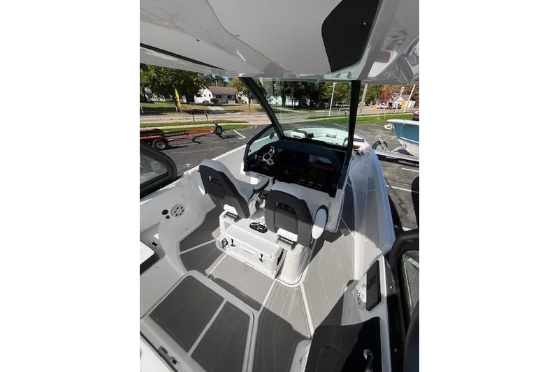 Slide: The Image of Interior view of 2026 Monterey Elite 27 SD boat cockpit with modern design. - 7