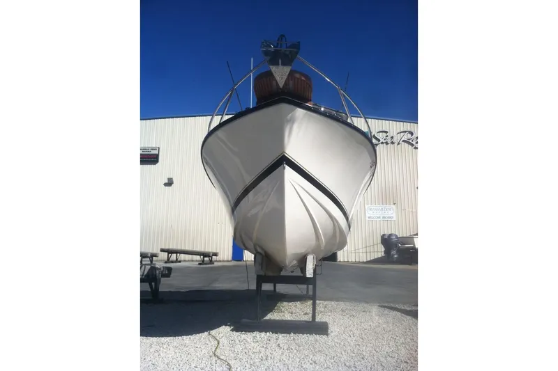 Slide: The Image of 1994 Albemarle Sportfish boat on display outside a building. - 20