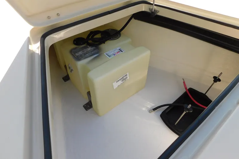 Slide: The Image of Interior view of Delta D-18 Tiller 2026 boat's bilge pump system. - 16
