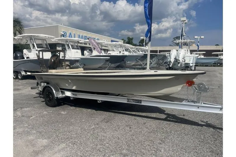 Slide: The Image of 2026 Delta Boatworks Delta D-18 Tiller, sleek design, outdoor setting, modern outboard motor. - 18