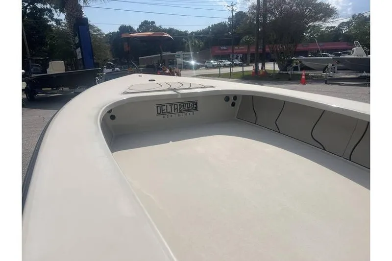 Slide: The Image of 2026 Delta Boatworks Delta D-18 Tiller with spacious interior and diamond-stitched seating. - 4