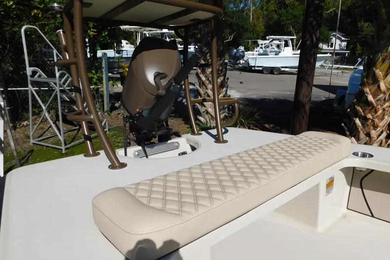 Slide: The Image of 2026 Delta Boatworks Delta D18 in a marina, surrounded by other boats. - 9