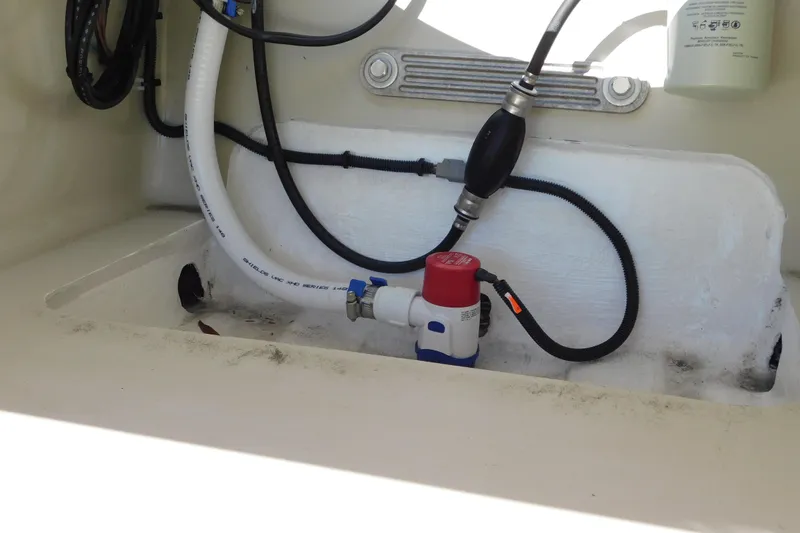 Slide: The Image of Control panel on 2026 Delta D-18 Tiller boat with switches for bilge pump and navigation lamps. - 15