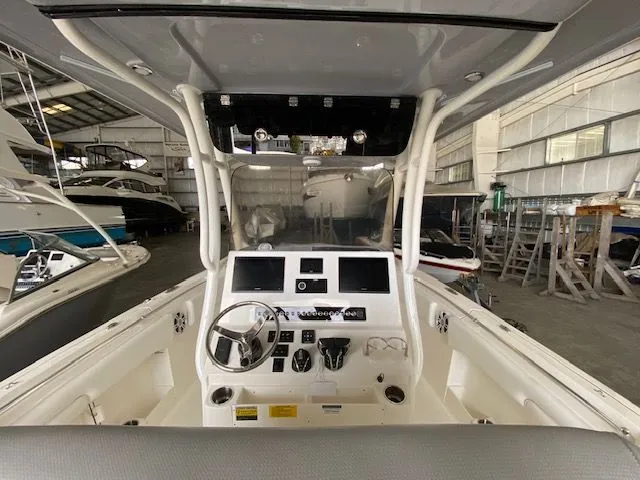Slide: The Image of 2026 Key West 263 FS boat with dual outboard engines on display. - 3