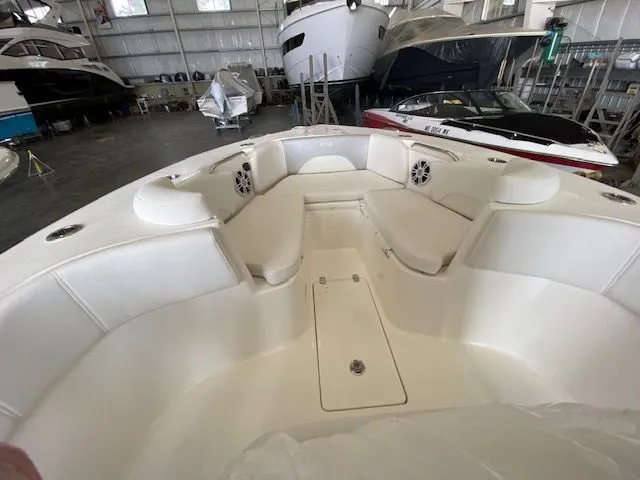 Slide: The Image of 2026 Key West 263 FS boat cockpit with modern controls and steering wheel. - 6