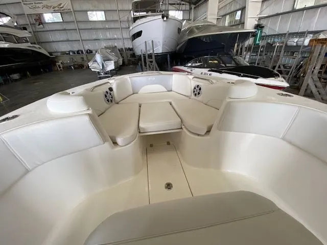 Slide: The Image of 2026 Key West 263 FS boat cockpit with modern steering and control panels. - 7