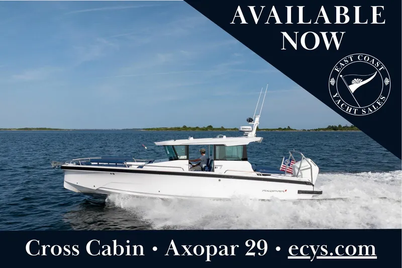 The Image of 2026 Axopar 29 XC Cross Cabin yacht cruising on open water, available at East Coast Yacht Sales. - 0