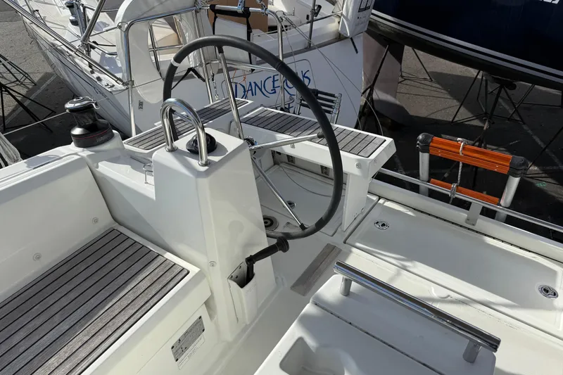 Slide: The Image of Beneteau Oceanis 35.1 yacht cockpit with steering wheel, 2021 model. - 6