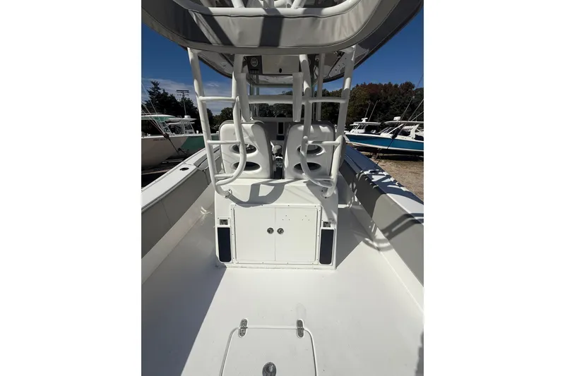 Slide: The Image of 2019 Cape Horn 32 XS boat interior with gray seating and cup holders. - 6