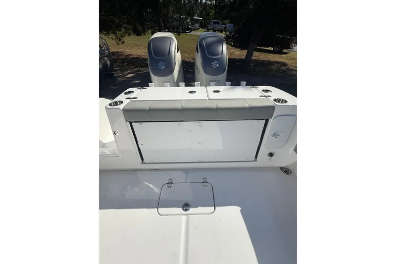 Slide: The Image of 2019 Cape Horn 32 XS boat interior with cushioned seating and built-in speakers. - 8