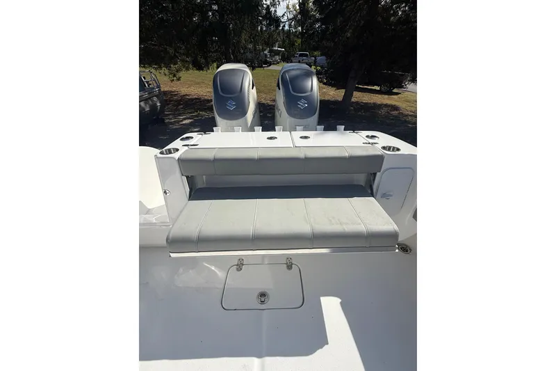 Slide: The Image of 2019 Cape Horn 32 XS boat with gray cushioned seating. - 9