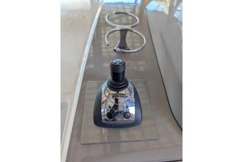 Slide: The Image of Control panel of a 2009 Chaparral Signature 350 boat with Volvo Penta joystick. - 11