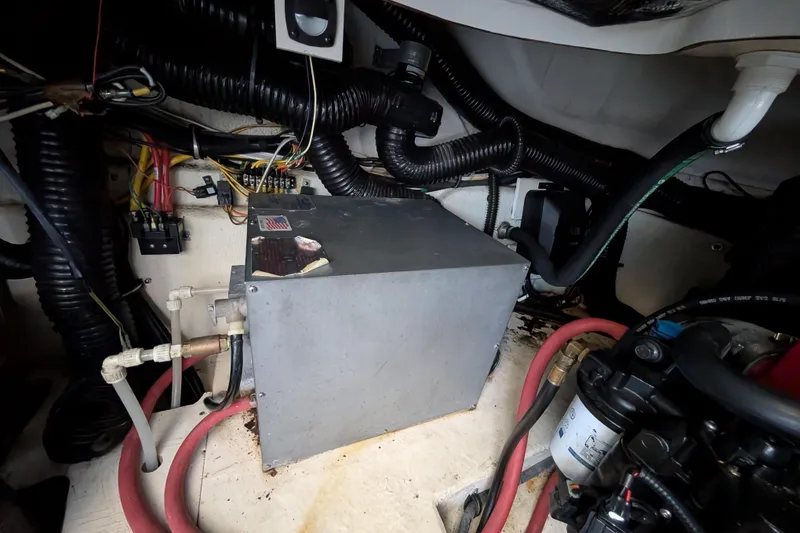 Slide: The Image of Engine compartment of 2009 Chaparral Signature 350 with wiring and components. - 32