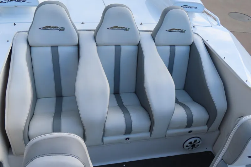 Slide: The Image of Three gray leather seats in a 1997 Skater 36 boat interior. - 20