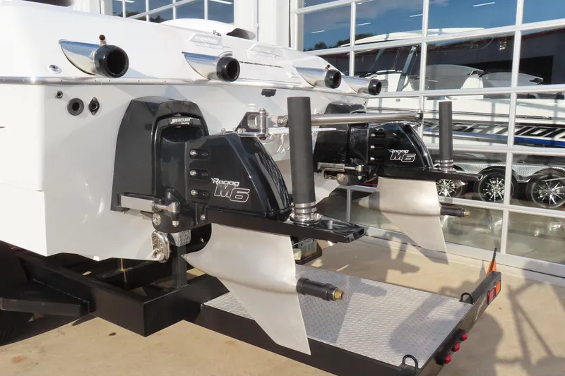 Slide: The Image of Rear view of a 1997 Skater 36 boat with Mercury Racing M6 drives. - 5