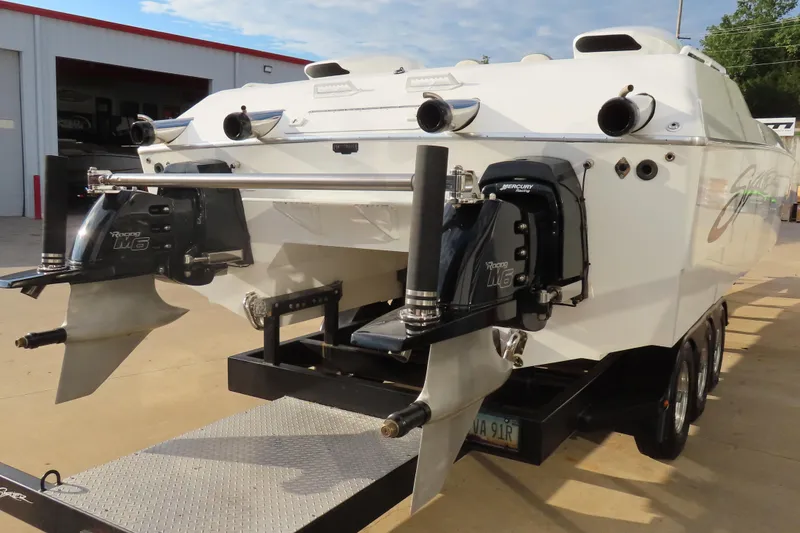 Slide: The Image of 1997 Skater 36 boat with dual Mercury Racing M6 engines on a trailer. - 6