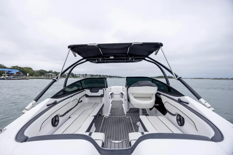 Slide: The Image of 2017 Yamaha Boats SX210 interior with seating, open water view, and sleek design. - 5