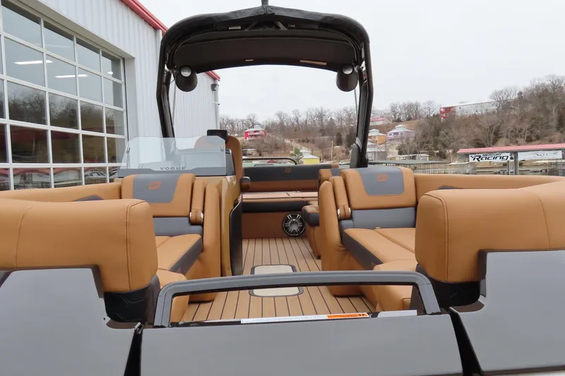 Slide: The Image of 2025 Princecraft Vogue 25 RL pontoon boat with luxurious seating and modern design. - 10