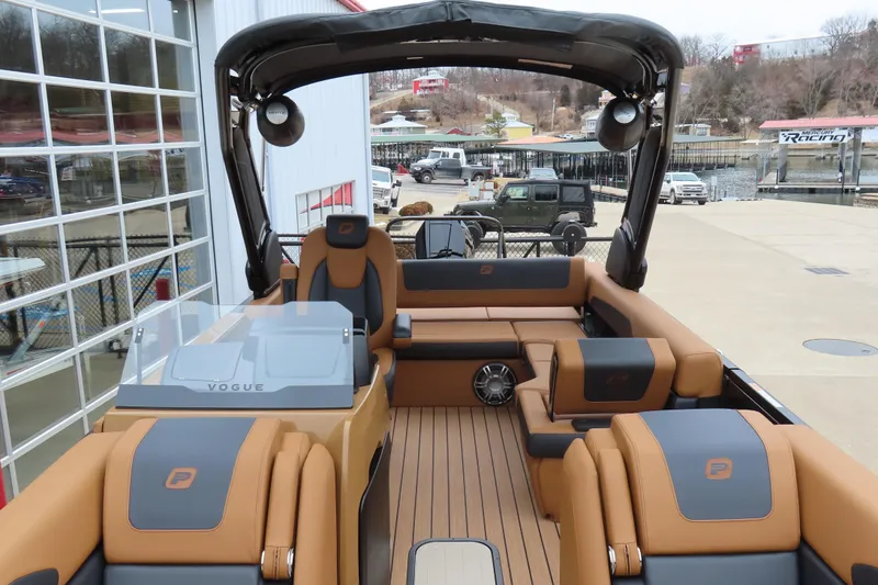 Slide: The Image of 2025 Princecraft Vogue 25 RL luxury pontoon boat with stylish seating and modern design. - 12