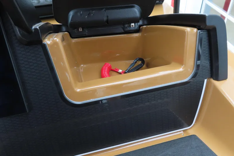 Slide: The Image of Storage compartment in 2025 Princecraft Vogue 25 RL boat with safety lanyard. - 15