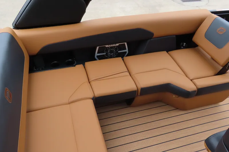 Slide: The Image of Luxurious tan seating on 2025 Princecraft Vogue 25 RL boat, featuring sleek design and comfort. - 42