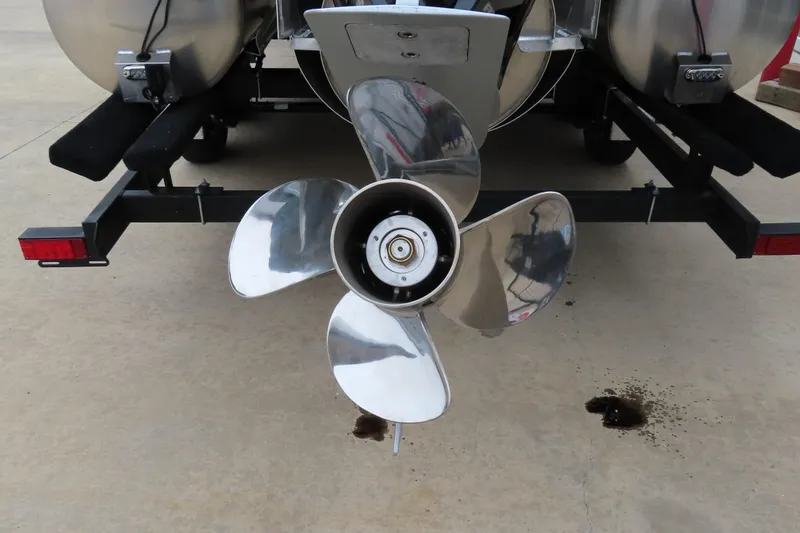 Slide: The Image of Propeller of 2025 Princecraft Vogue 25 RL boat on trailer. - 6