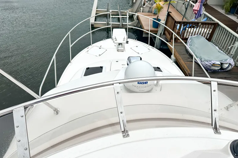 Slide: The Image of 2022 Cutwater 30 Command Bridge boat docked at marina, view from command bridge. - 52