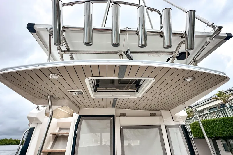 Slide: The Image of 2022 Cutwater 30 Command Bridge boat with sleek design and stainless steel features. - 8