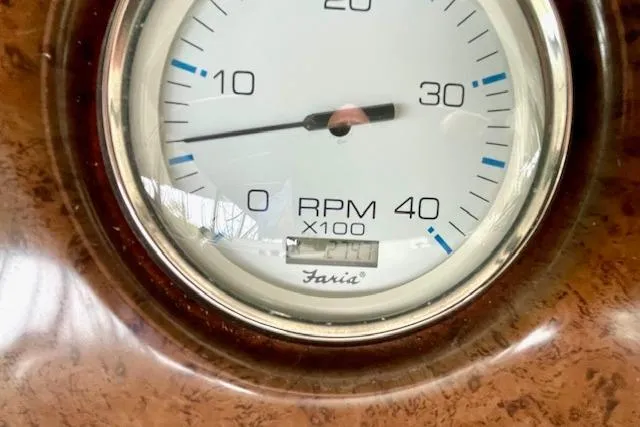 Slide: The Image of Close-up of a Faria tachometer on a 2002 Silverton 43 Motor Yacht dashboard. - 10