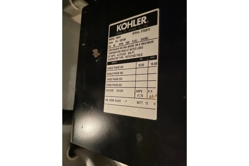 Slide: The Image of Kohler generator label on 2002 Silverton 43 Motor Yacht, diesel-powered specifications. - 58