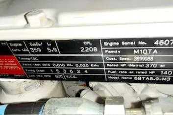 Slide: The Image of Engine specifications label on a 2002 Silverton 43 Motor Yacht. - 66