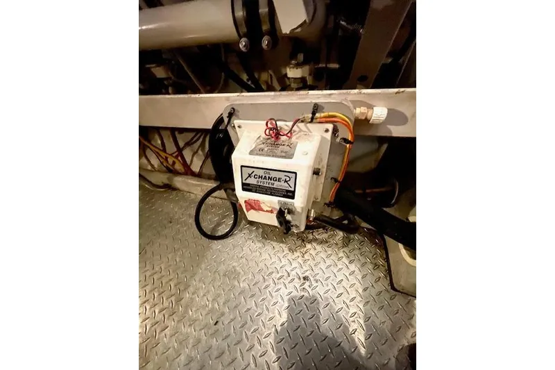 Slide: The Image of Oil change system in 2002 Silverton 43 Motor Yacht engine room. - 67