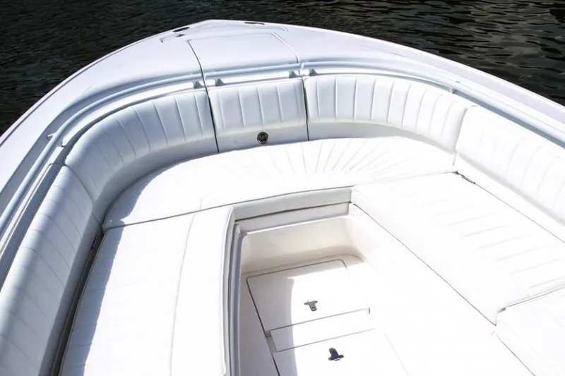 Slide: The Image of Control panel of a 2022 Intrepid 327-I CC boat with Garmin and Icom devices. - 12