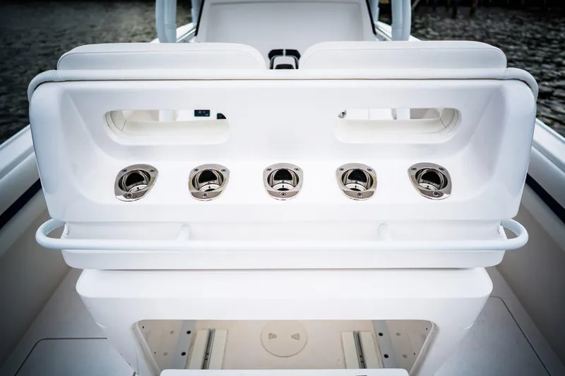 Slide: The Image of 2022 Intrepid 327-I CC boat interior with white quilted seating. - 15