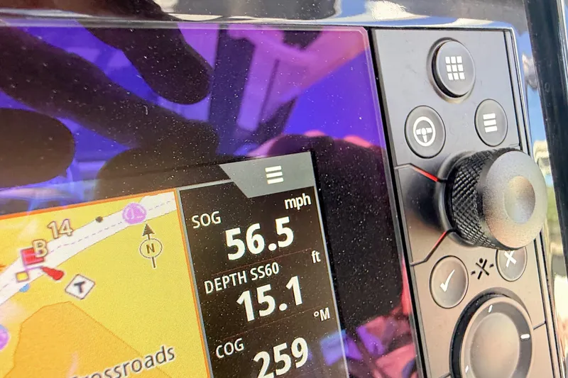 Slide: The Image of 2025 Chaparral 280 OSX boat interior with modern dashboard and luxurious seating. - 4