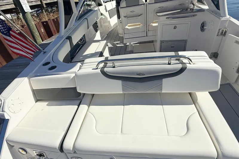 Slide: The Image of 2025 Chaparral 280 OSX boat with Yamaha engines, featuring spacious seating and modern design. - 9