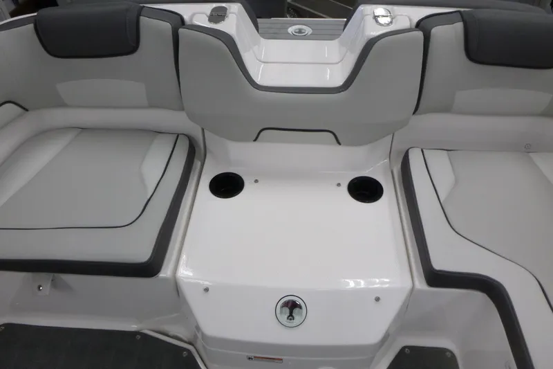 Slide: The Image of 2026 Yamaha AR190 boat interior with gray seating and cup holders. - 10