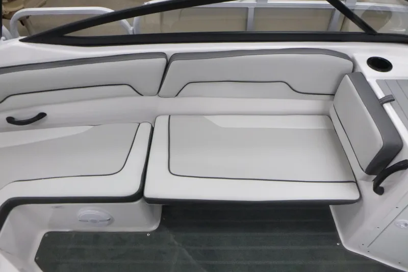 Slide: The Image of 2026 Yamaha AR190 boat interior with sleek white seating and black accents. - 8