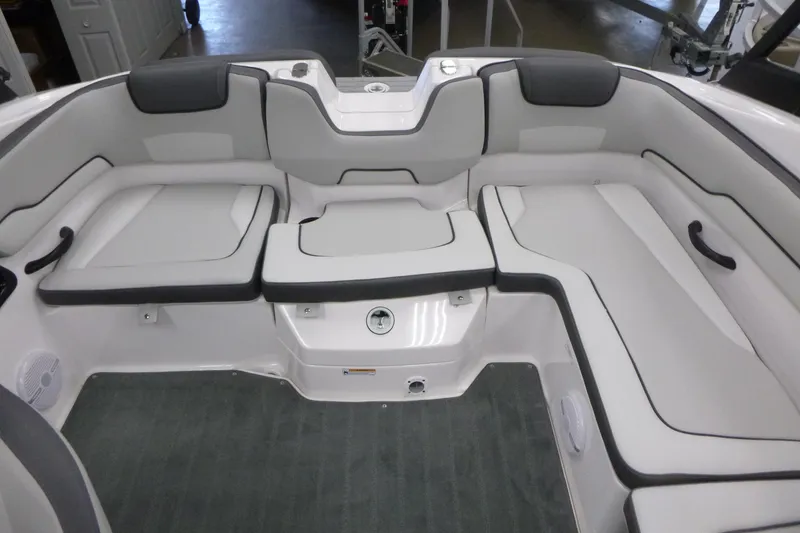 Slide: The Image of 2026 Yamaha Boats AR190 interior seating with gray and white upholstery. - 9