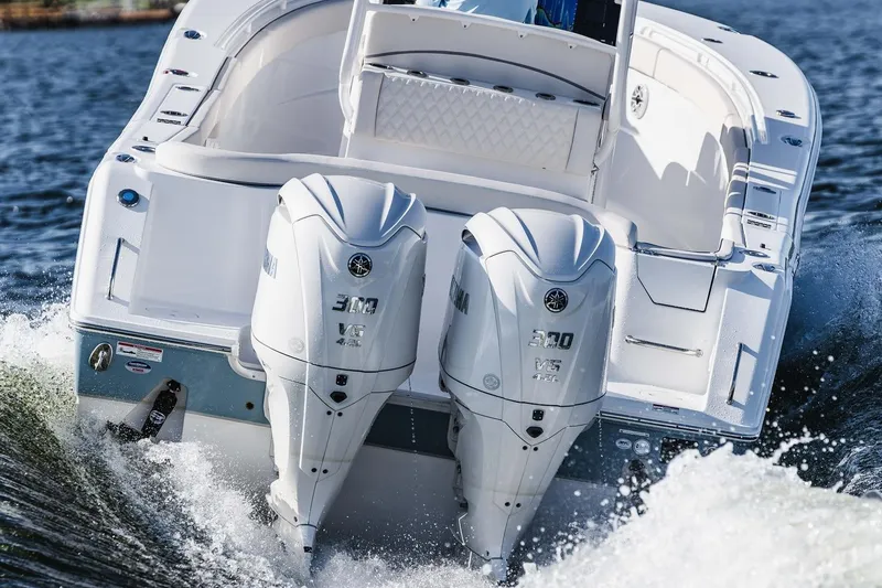 Slide: The Image of 2026 Sea Hunt Ultra 285 Coffin Box boat interior with open storage compartment. - 6