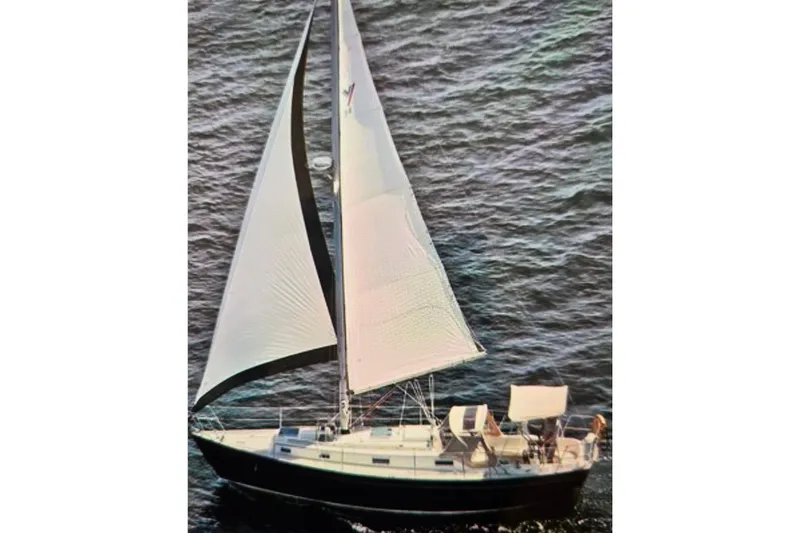 Slide: The Image of Sailing on open water, 1986 Victoria 34 Sloop with full sails. - 54
