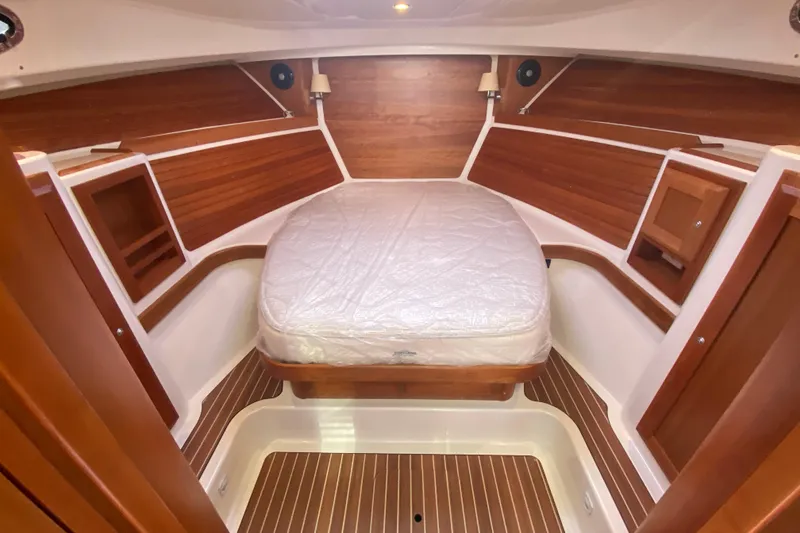 Slide: The Image of Interior of 2022 Back Cove 34O yacht with modern kitchen and seating area. - 12