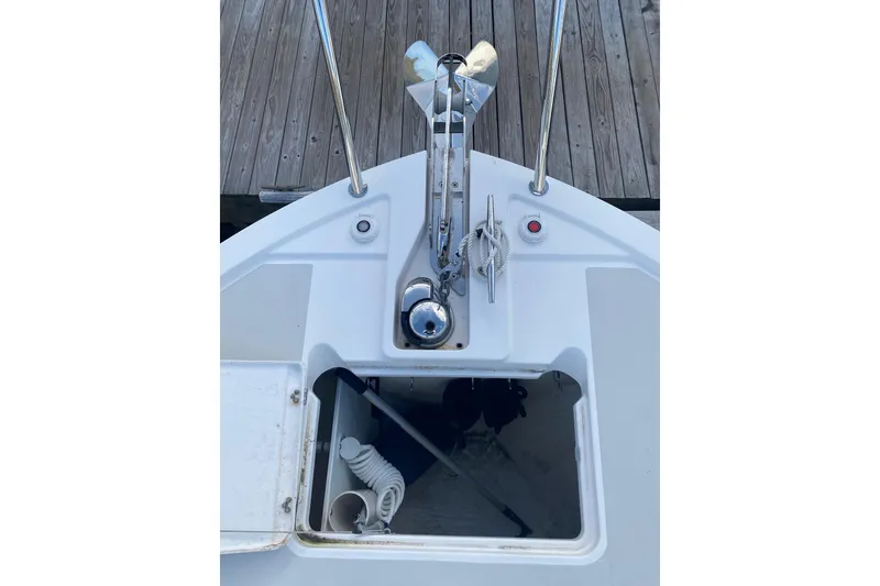 Slide: The Image of 2022 Back Cove 34O yacht bathroom with wooden cabinetry and modern fixtures. - 25