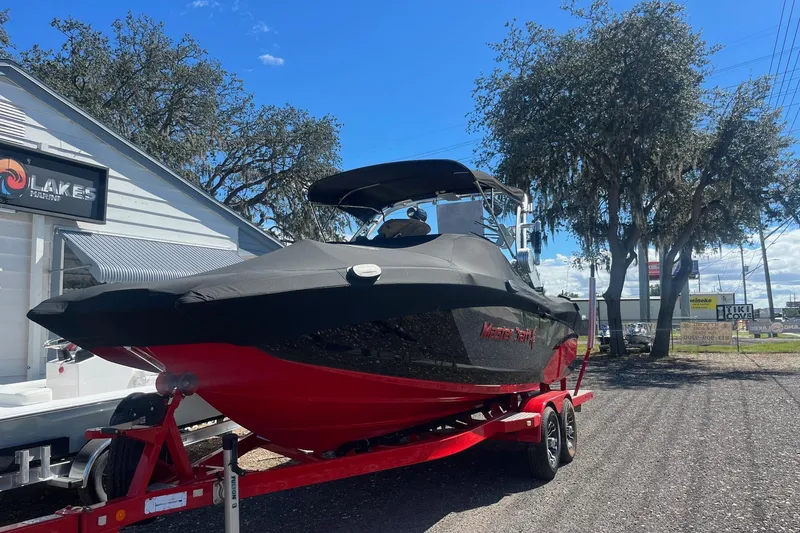 The Image of 2017 MasterCraft X23 boat on trailer at Lakes Marine dealership. - 0