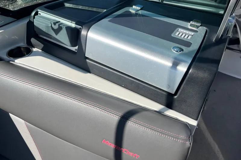 Slide: The Image of 2017 MasterCraft X23 boat interior with dashboard and seating detail. - 12